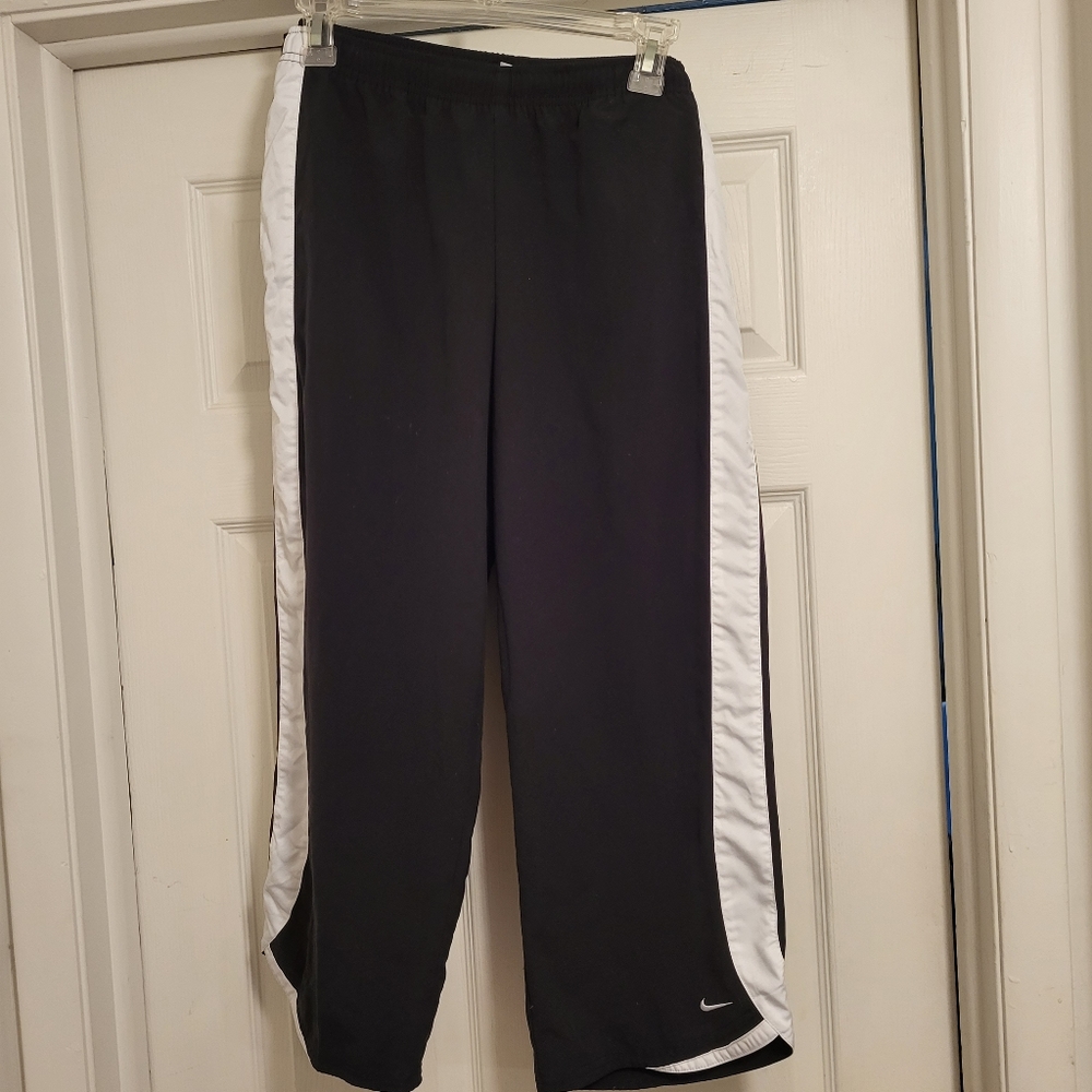 Nike , women, black with white strips on legs